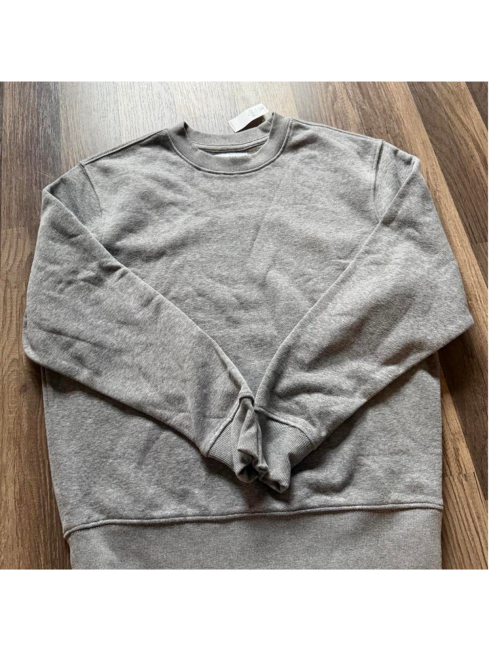 NWT heather gray unisex crewneck sweatshirt with a classic boxy fit